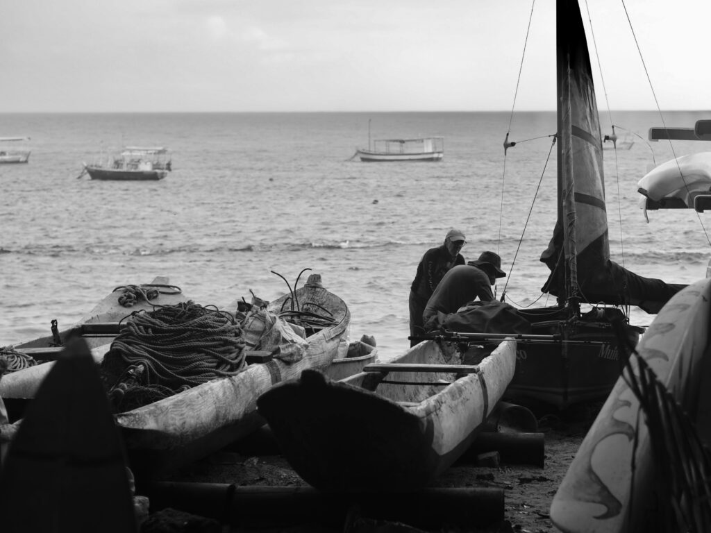 Pescadores en la playa de Barra